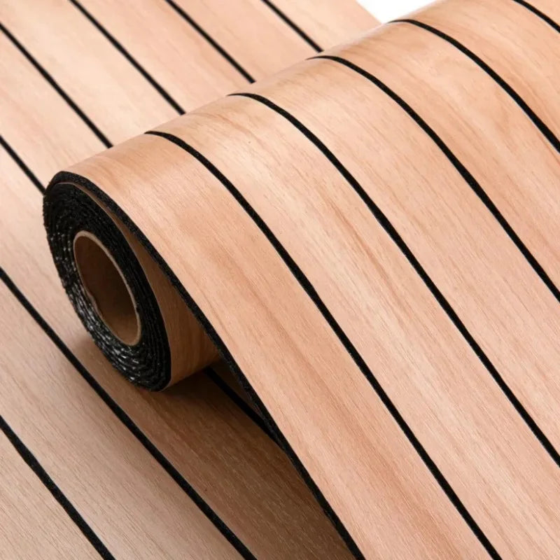 Roll of light wood veneer panel with black lines, showing the texture and layered construction.