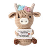 Handmade crochet Highland cow doll with colorful ears and a card that says I may be a tiny highland cow but I believe in you 