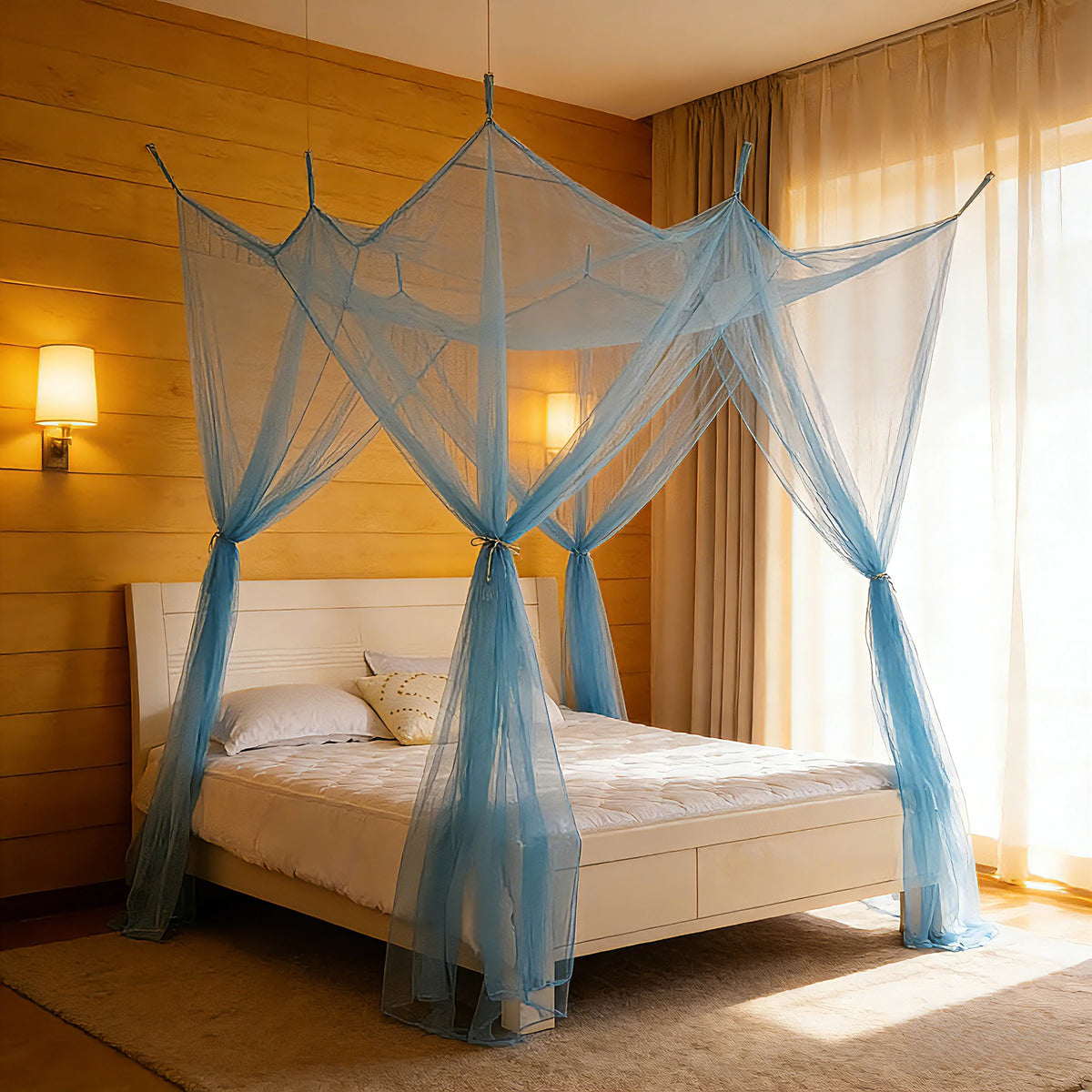 A bed with a sheer blue mosquito net canopy draped over the headboard in a warm-toned room.