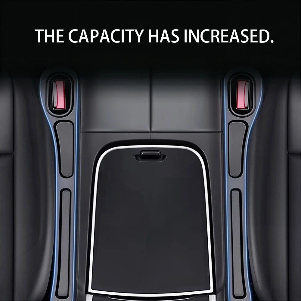 Interior view of a car seat with a gap filler organizer installed, showing the increased capacity.