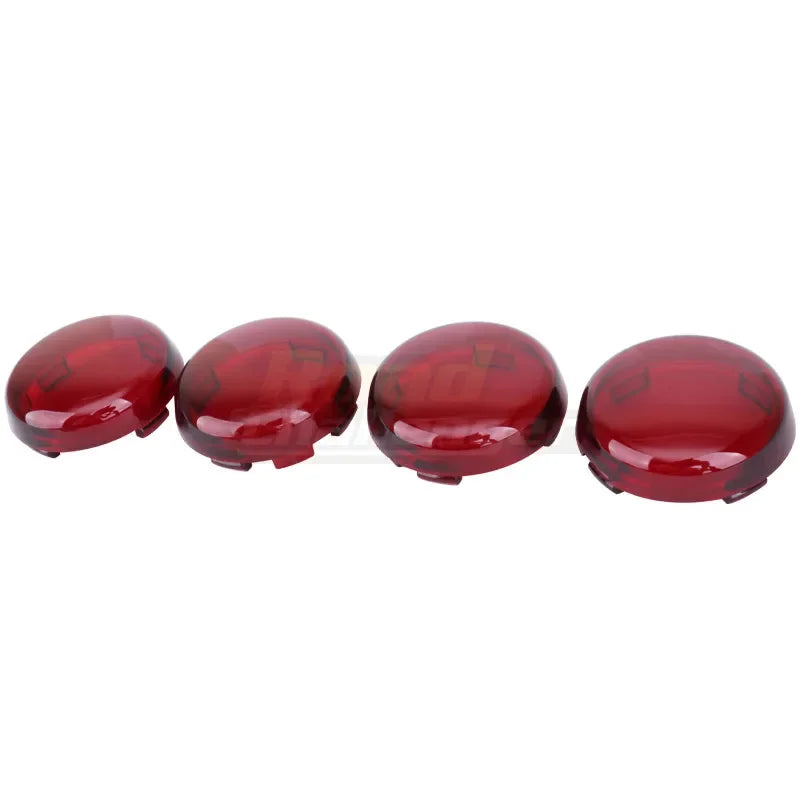 A set of five red LED turn signal light lens covers for Harley Davidson motorcycles.