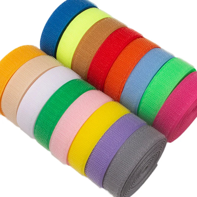 Rolls of colorful sew-on hook and loop tape in various shades including blue, green, yellow, orange, red, pink, and gray.
