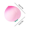 Jouet anti-stress pêche rose squishy montrant ses dimensions.
