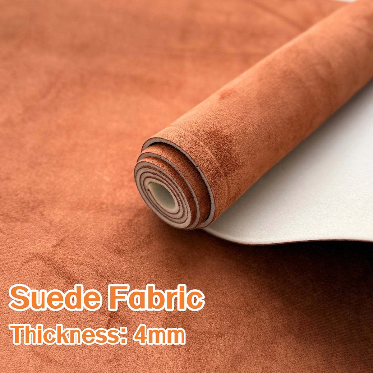 Roll of brown suede fabric with a white backing showing the thickness of 4mm