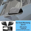 Glossy black carbon fiber grain decorative trim piece for a Ford Mustang interior.
