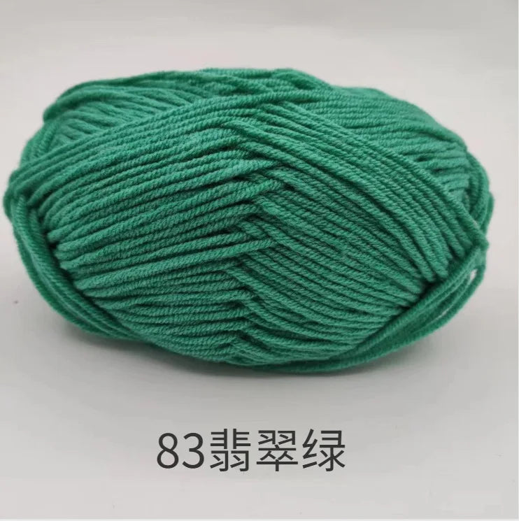 A ball of teal green 83-ply yarn for knitting and crochet
