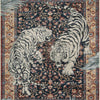 A richly patterned area rug featuring a stylized jungle tiger print in black, white, and gold tones.