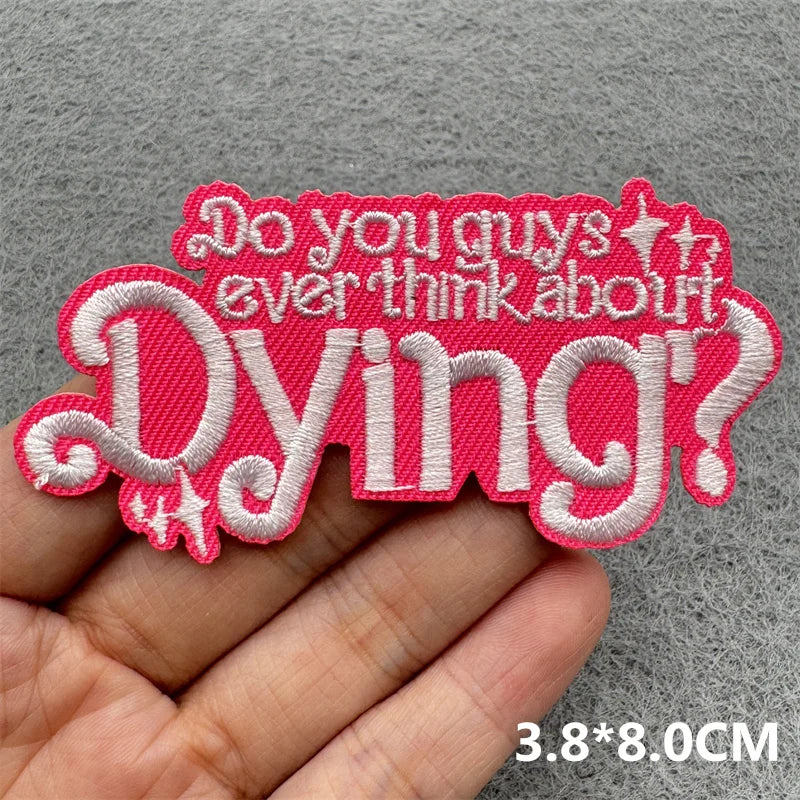 Pink embroidered patch with text Do you guys ever think about Dying