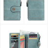 A teal leather wallet shown in two views, featuring multiple card slots and a decorative clasp.