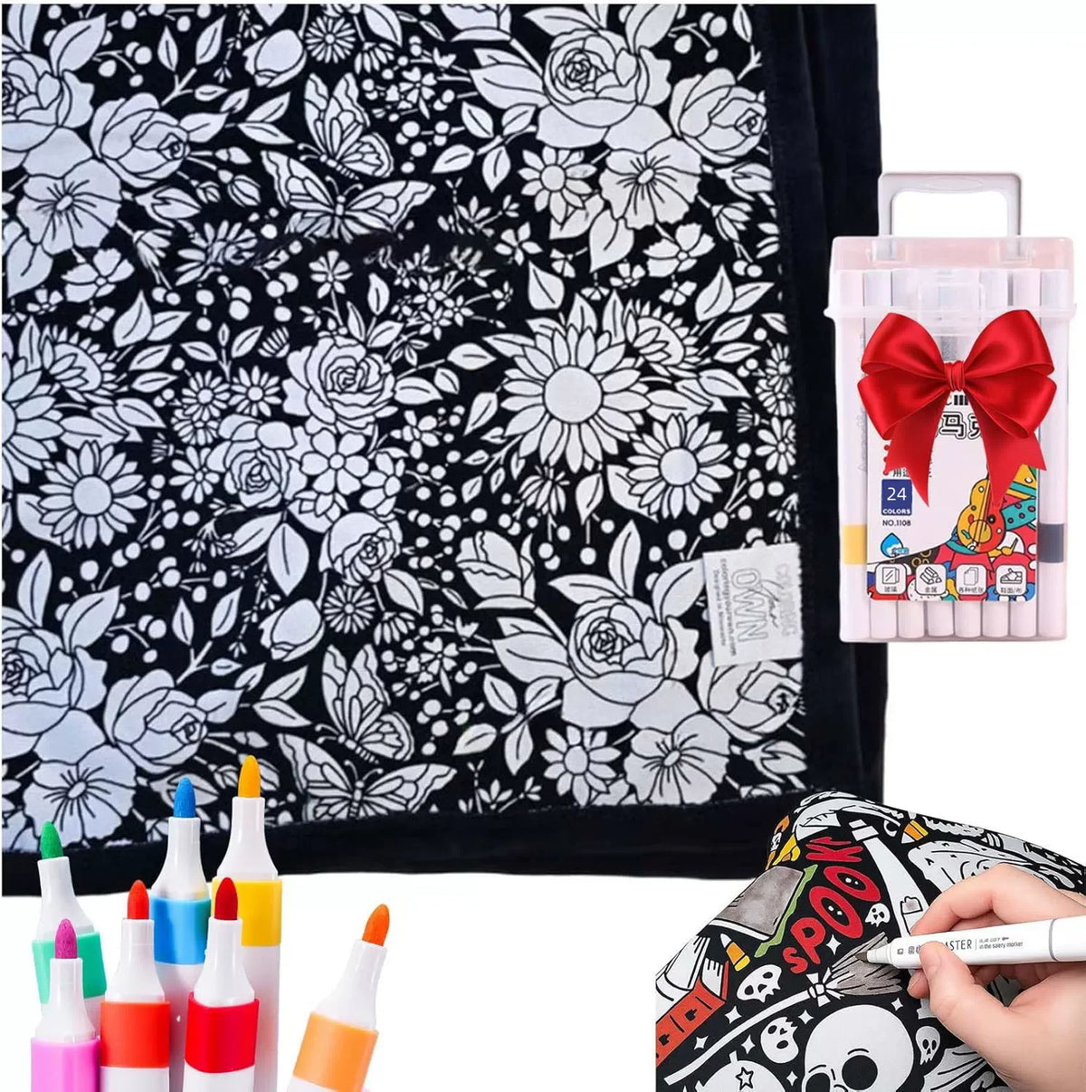 A black and white floral pattern blanket with a set of 24 washable markers displayed next to it.