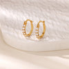 Boucles d'oreilles créoles en zircon cubique ton or