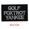 Black embroidered iron-on letter patch with white text reading GOLF FOXTROT YANKEE