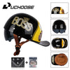 Black motorcycle helmet with gold Boss logo and brown visor shown next to accessories.