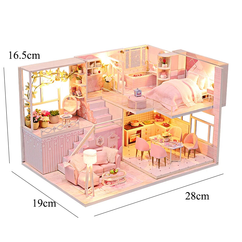 A miniature wooden dollhouse building kit featuring pink furniture, a bed, and decorative elements.