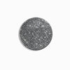 A circular coaster made of small, shiny, silver-toned studs or diamonds.