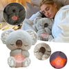 A plush koala toy with a soothing light feature is shown next to a person in a cozy setting.