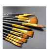 A collection of twelve black handles with gold ferrules and brown bristles for painting brushes.