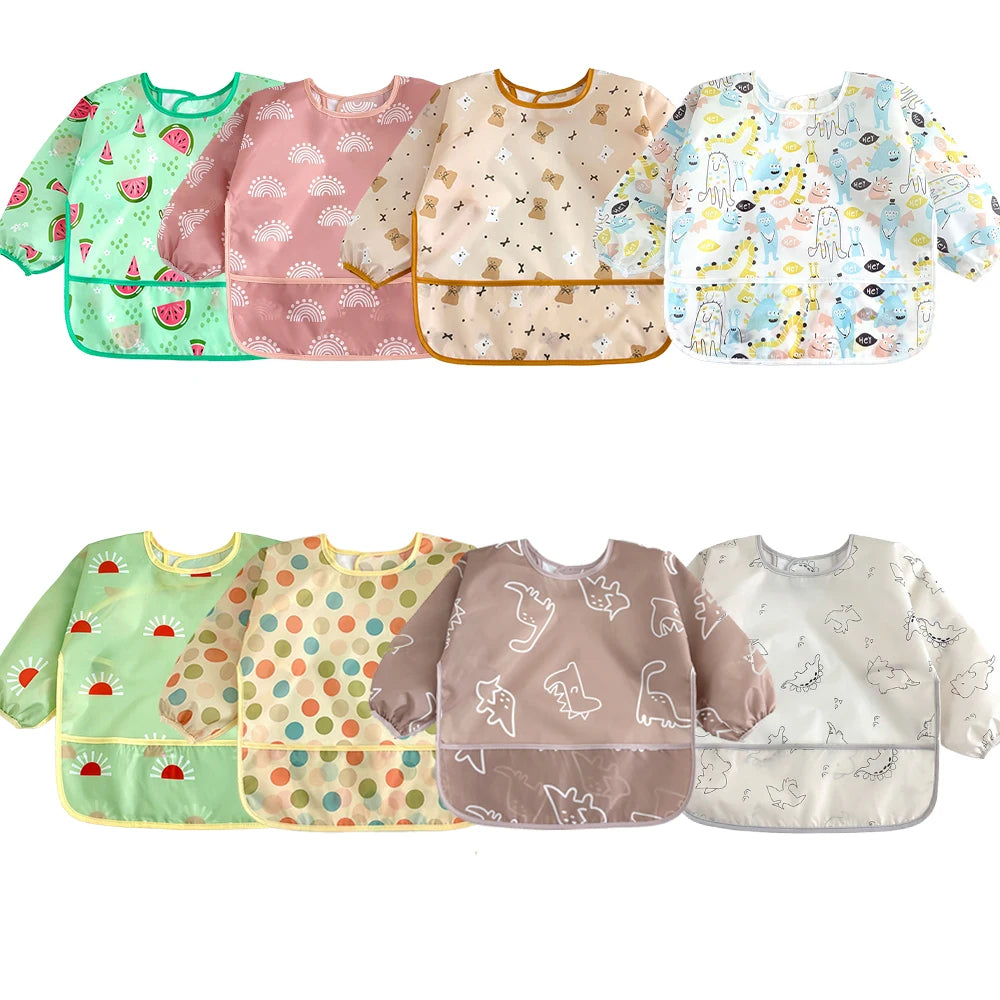 A collection of five pastel-colored waterproof long-sleeve baby bibs featuring various cute animal and nature patterns.