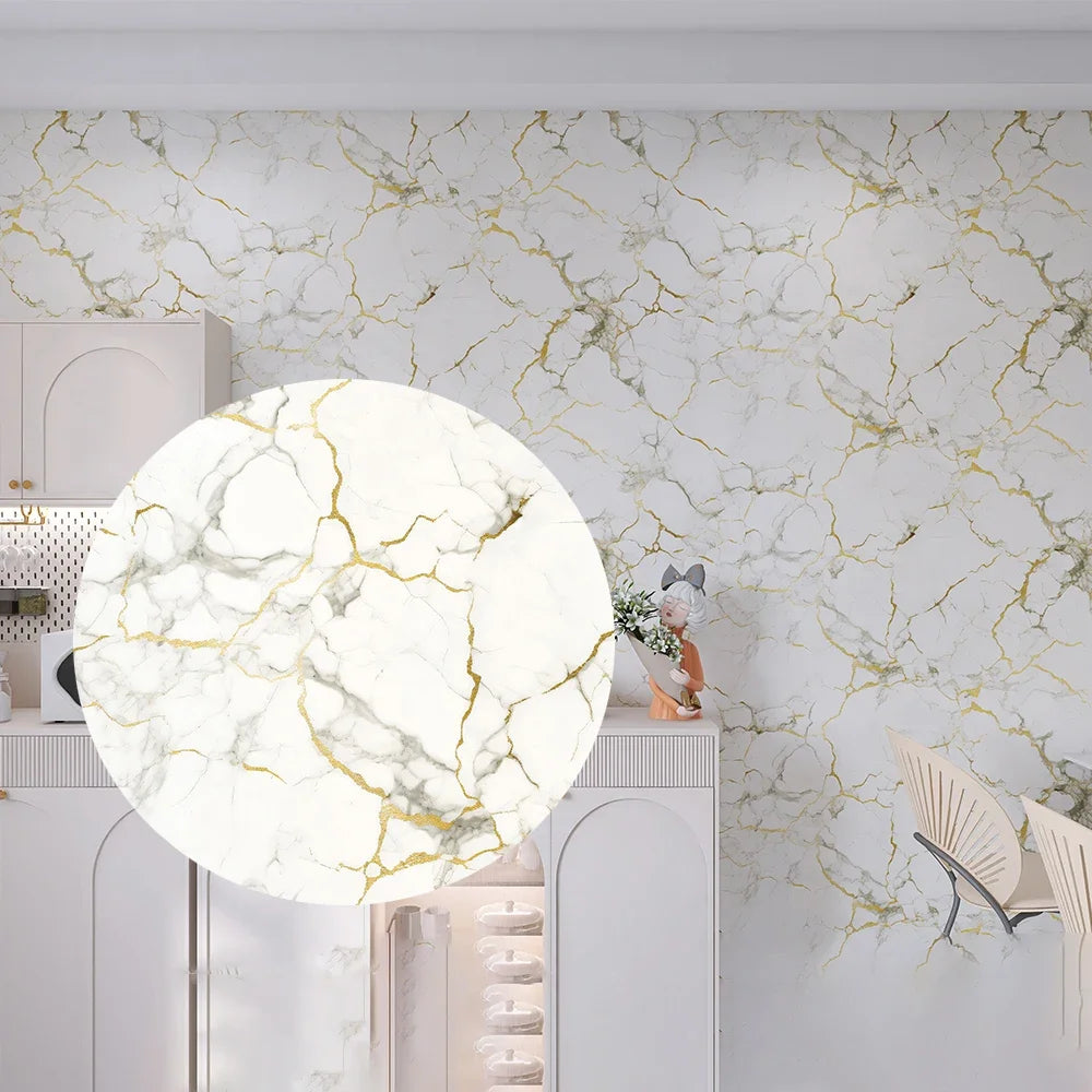 Marble pattern peel and stick self-adhesive wallpaper covering a kitchen wall with white and gold veining