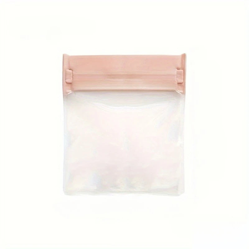 A clear plastic jewelry storage bag with a pink sealing flap, designed for rings, necklaces, and bracelets.