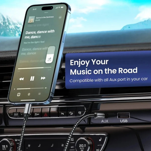 A smartphone is shown connected to an AUX port in a car, demonstrating audio functionality.