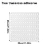 A sheet of clear, traceless adhesive with a grid pattern for mounting purposes.