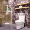 A modern bathroom featuring a toilet and marble-patterned walls with wooden shelves.