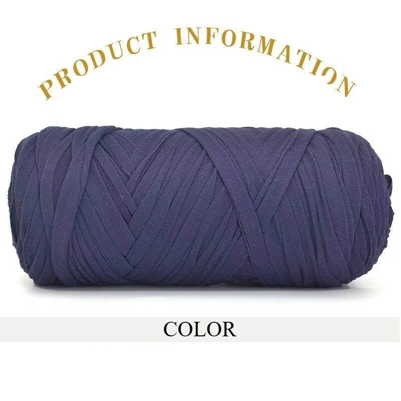 A skein of dark navy blue thick polyester blend yarn for knitting and crochet.