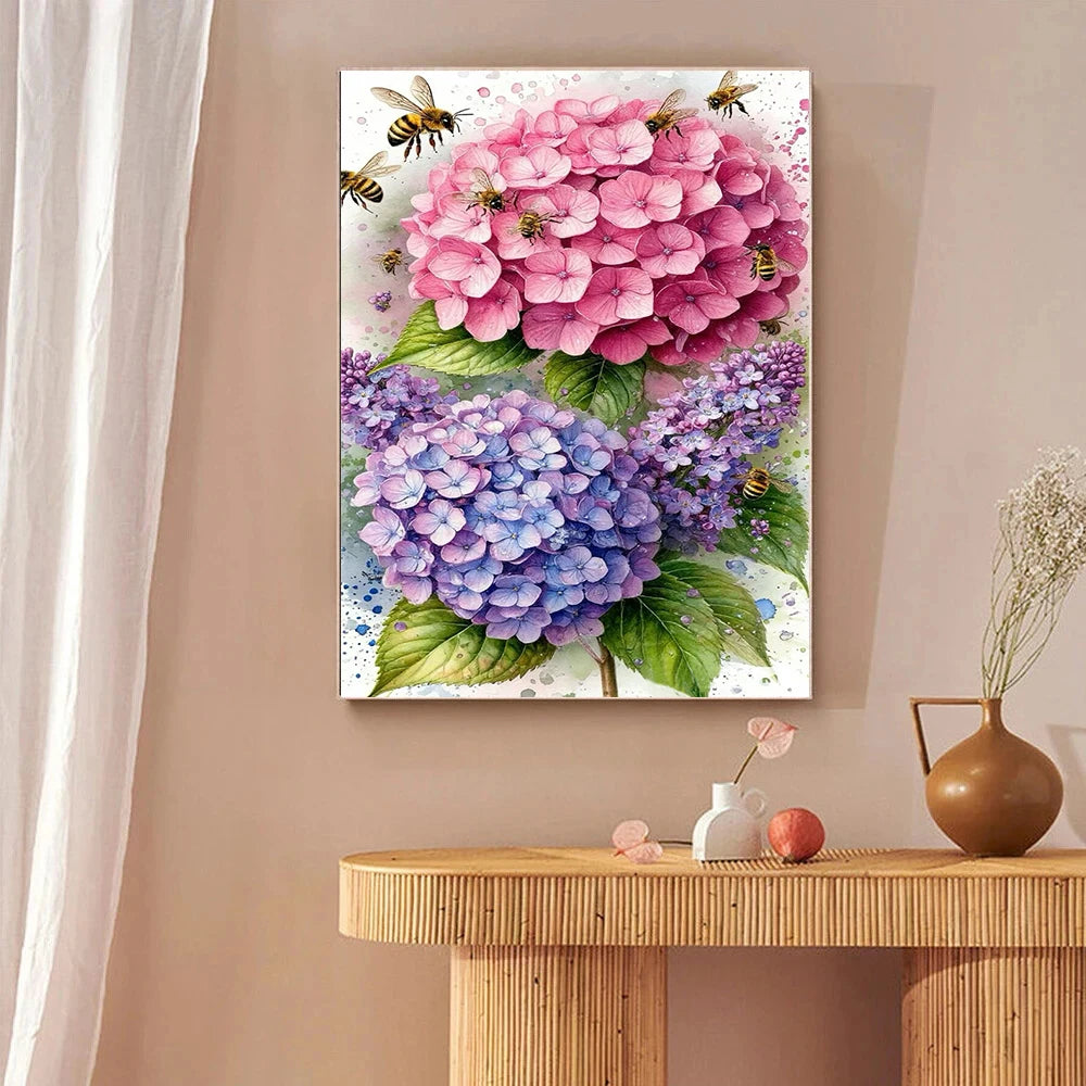 A painting features pink and purple hydrangeas with bees, suitable for a diamond painting kit.