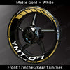A close-up view of a motorcycle wheel featuring matte gold and white decals for the MT-07 model.