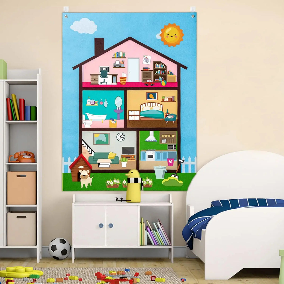 A colorful felt story busy board depicting a house with various farm animals and learning elements.