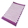 Purple acupressure mat and pillow set with numerous white massage dots for pain relief