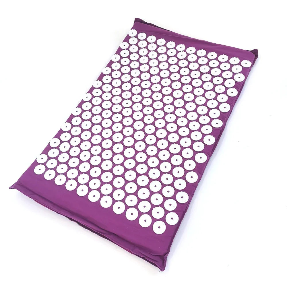 Purple acupressure mat and pillow set with numerous white massage dots for pain relief
