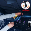 A hand is demonstrating the 360 degree rotation feature of a foldable car sun shade umbrella on a vehicle dashboard.