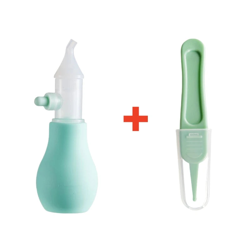 A light teal baby nasal aspirator device with a soft silicone tip and a green plastic component.