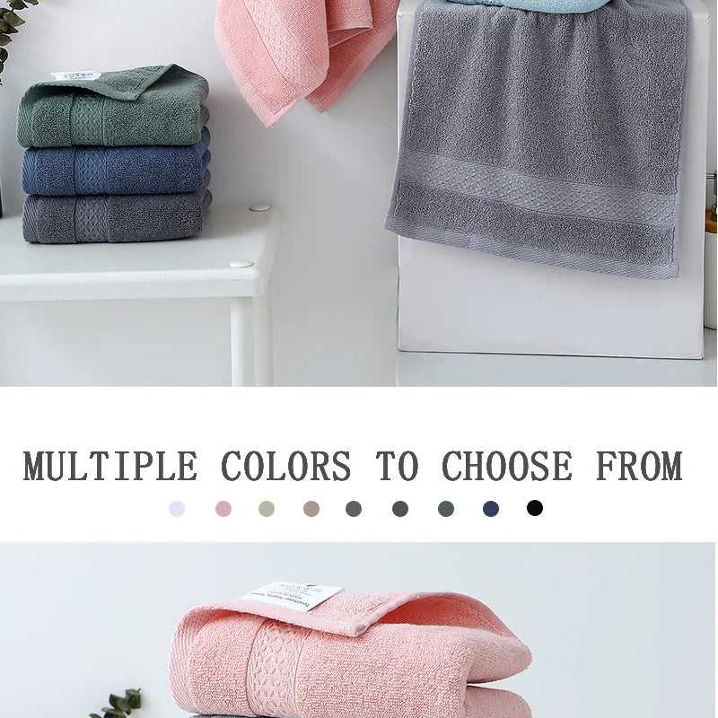 A collection of six folded face towels in various shades of green, blue, and gray are displayed on a white surface.
