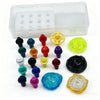 A collection of colorful spinning top customization accessories, including various colored tops and a clear storage box.