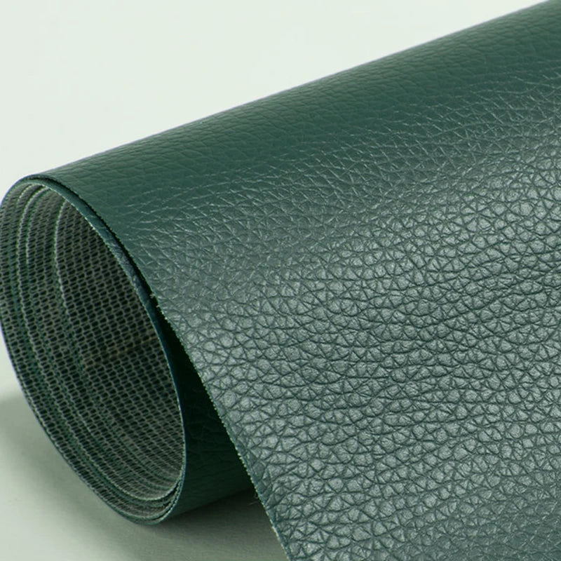 Roll of dark green self-adhesive PU leather repair patches shown from the side.