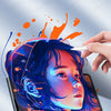 A hand is applying a matte paper film screen protector for an iPad, showing vibrant colors on the device.