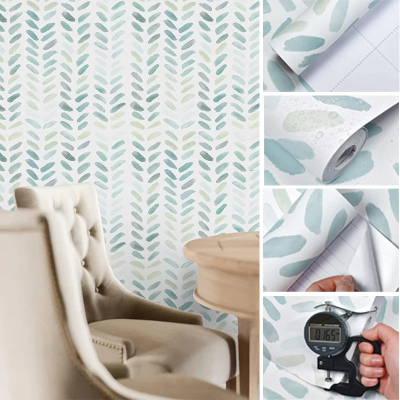 Close-up of boho leaf peel-and-stick wallpaper in green and white, showing texture and application on a surface.
