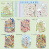 A collection of miniature scene stickers featuring various houses, landscapes, and themed scenes for crafting.