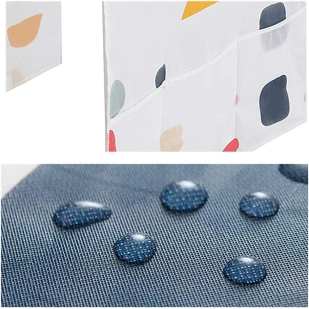 A close-up view of a refrigerator dust cover with storage pockets featuring various pastel and dark colored fabric sections.