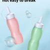 Two plastic bottles of innovative bubble water in pink and green colors with clear bubbles