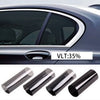Rolls of black window tint film used for automotive window tinting