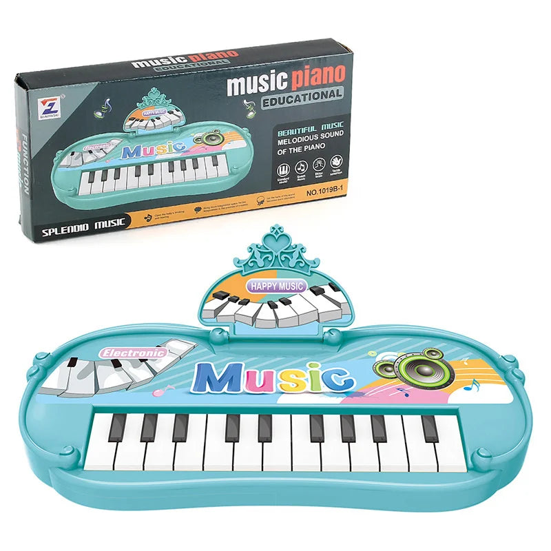 A light blue electronic piano toy with a microphone and a box for the music educational set.