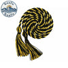 A spool of black and yellow graduation honor cords with tassels, coiled into a spiral.