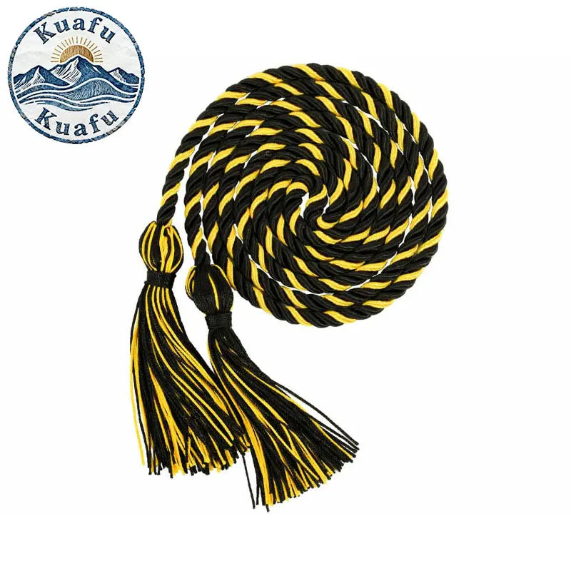 A spool of black and yellow graduation honor cords with tassels, coiled into a spiral.