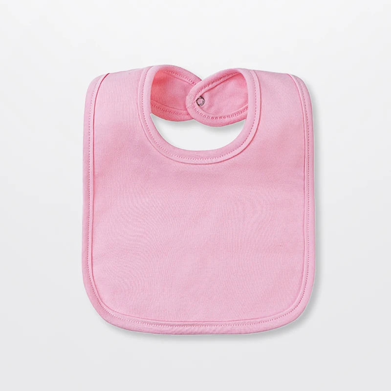 A pink cotton bandana bib for babies shown against a white background.
