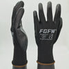 A pair of black breathable PU-coated work gloves with reinforced grip and EN 388:2016 certification visible.