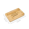 A light brown natural bamboo soap dish with three drainage slots.